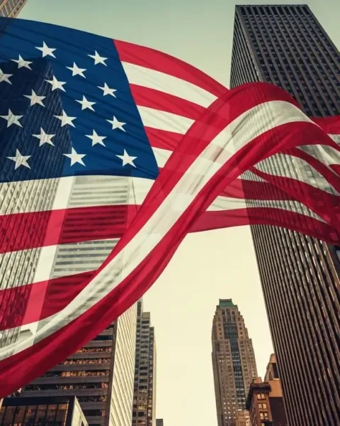 Bandera de Estados Unidos entre edificios de oficinas